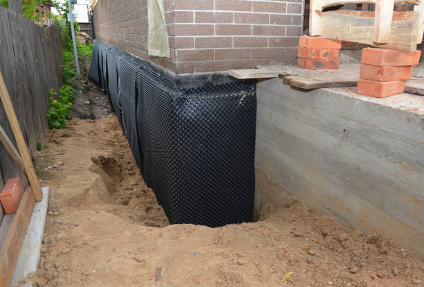 Happy homeowners after waterproofing job in Oakpark